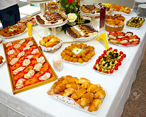 ۱۰۰۴۶۳۳۱-close-up-of-catering-food-on-table-stock-photo-buffet-table-appetizer